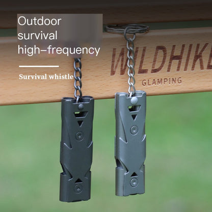 Stainless steel emergency survival whistle attachment ring detail