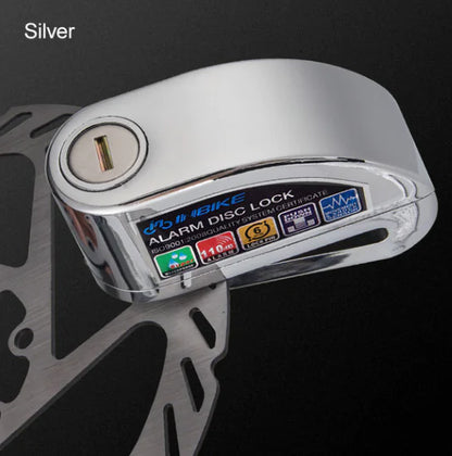INBIKE Impact-Sensing Disc Brake Lock secured on a brake rotor, showcasing its silver finish and alarm features.