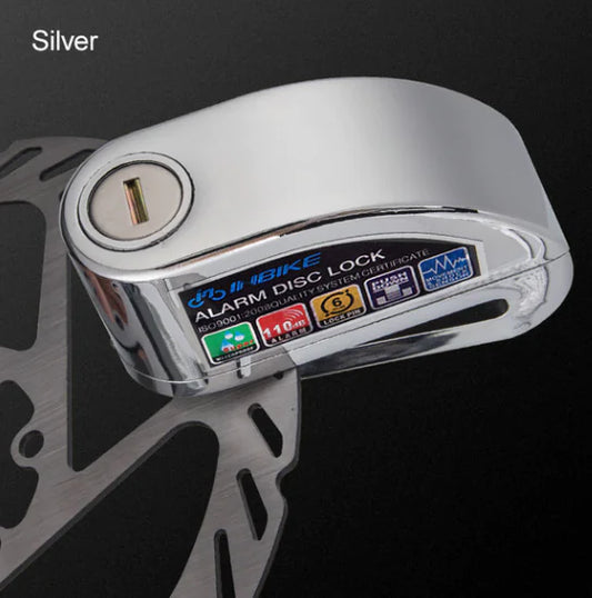 INBIKE Impact-Sensing Disc Brake Lock secured on a brake rotor, showcasing its silver finish and alarm features.